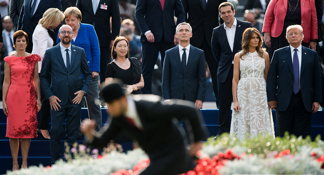 l r pm michel 039 s partner amelie derbaudrenghien belgian prime minister charles michel first lady of france brigitte macron chancellor of germany angela merkel stoltenberg 039 s partner ingrid schulerud nato secretary general jens stoltenberg prime minister of greece alexis tsipras first lady of the us melania trump and us president donald trump watch a show ahead of a working dinner at the parc du cinquantenaire   jubelpark park in brussels on july 11 2018 during the north atlantic treaty organization nato summit photo afp