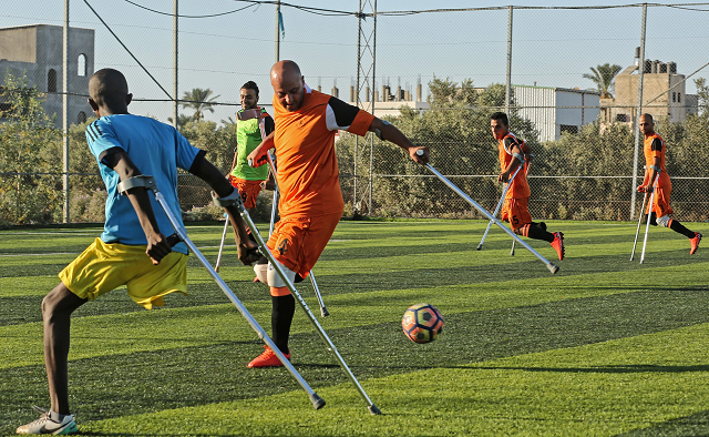 gaza 039 s only amputee football team during a match photo afp gaza 039 s only amputee football team during a match photo afp
