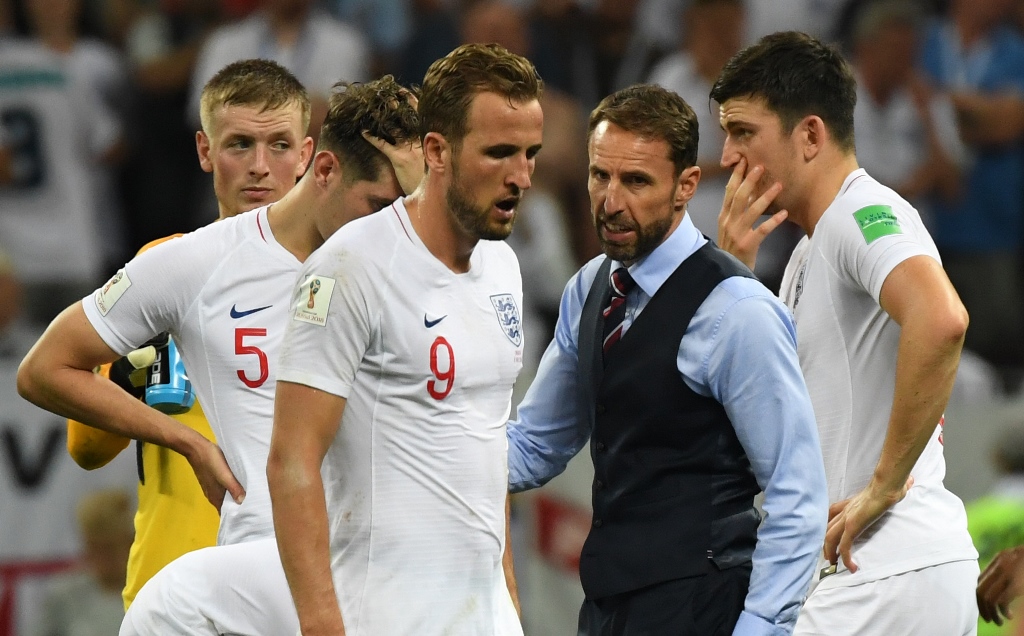 no blame game southgate refused to criticise skipper kane who was well below par against croatia saying that they must stay strong as a group photo afp