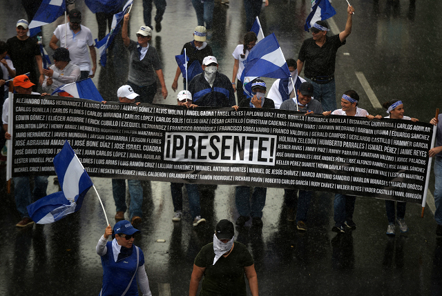 nicaraguan opposition demonstrators take part in a nationwide march called quot united we are a volcano quot in managua on july 12 2018 photo afp