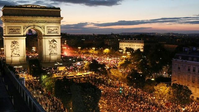 hundreds of thousands of people poured onto the champs elysees avenue last tuesday after france secured its ticket to the world cup final photo afp hundreds of thousands of people poured onto the champs elysees avenue last tuesday after france secured its ticket to the world cup final photo afp