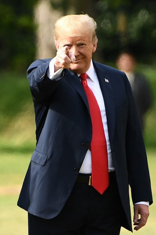 us president donald trump r gestures as he talks with us ambassador to the united kingdom woody johnson on july 13 2018 photo afp us president donald trump r gestures as he talks with us ambassador to the united kingdom woody johnson on july 13 2018 photo afp