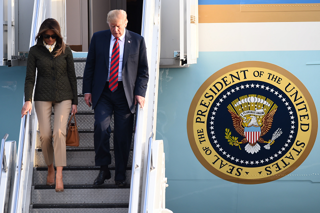 us president donald trump disembarks air force one with us first lady melania trump at prestwick airport south of glasgow photo afp