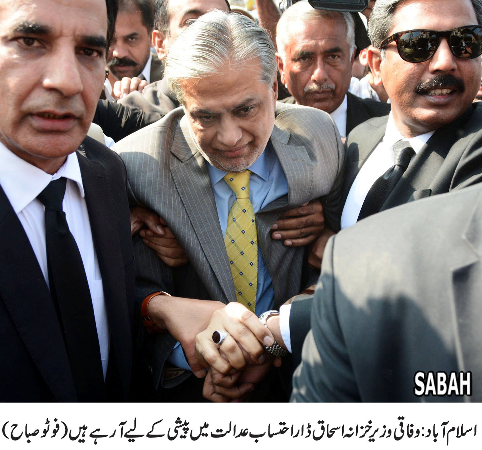 former finance minister ishaq dar appearing before an accountability court in islamabad photo express