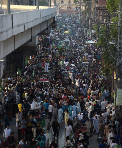 supporters of ousted pakistani prime minister nawaz sharif take part in a march towards the airport ahead of the arrival of nawaz photo afp supporters of ousted pakistani prime minister nawaz sharif take part in a march towards the airport ahead of the arrival of nawaz photo afp