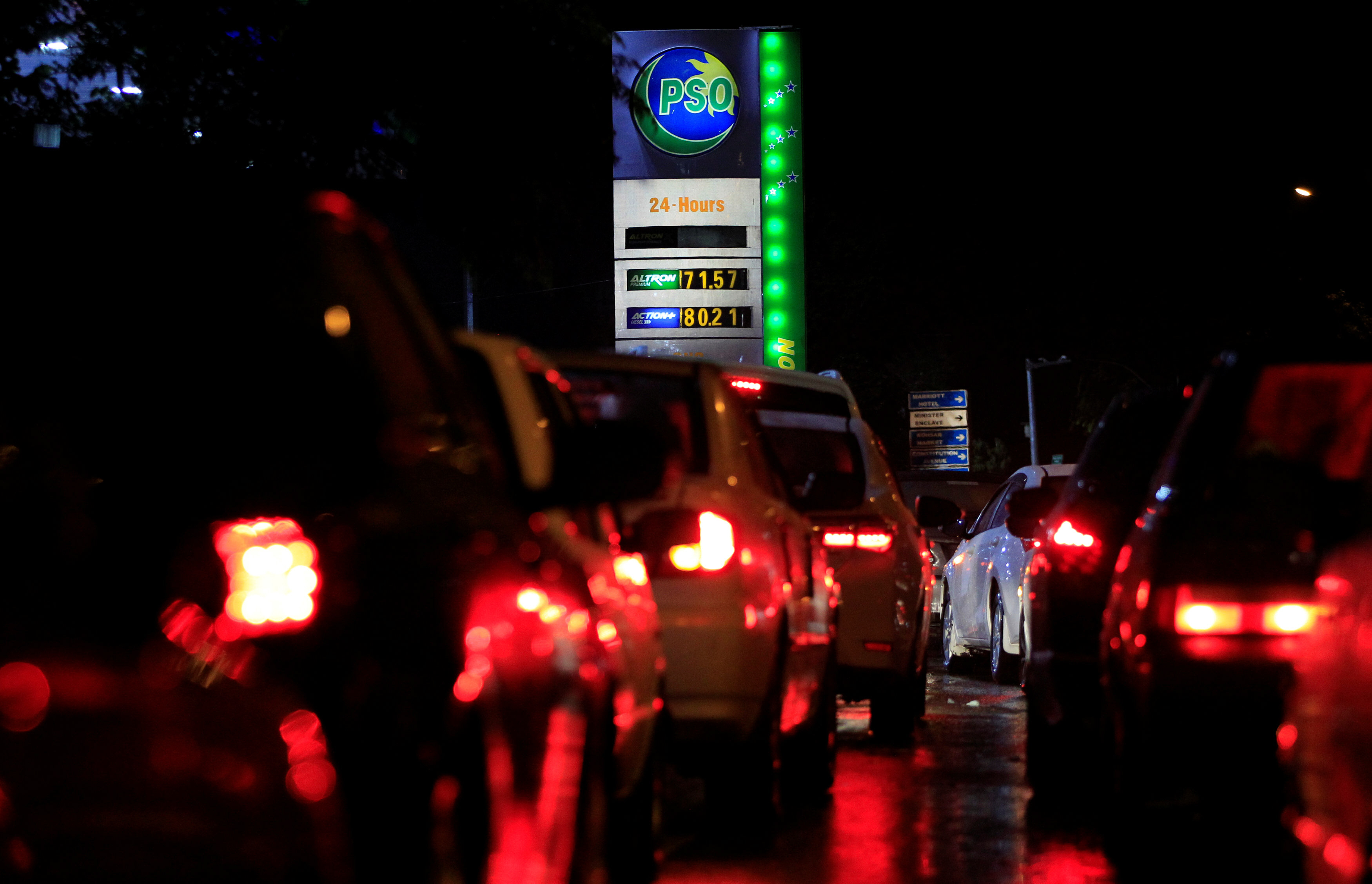 cars queue at a pso pump photo afp