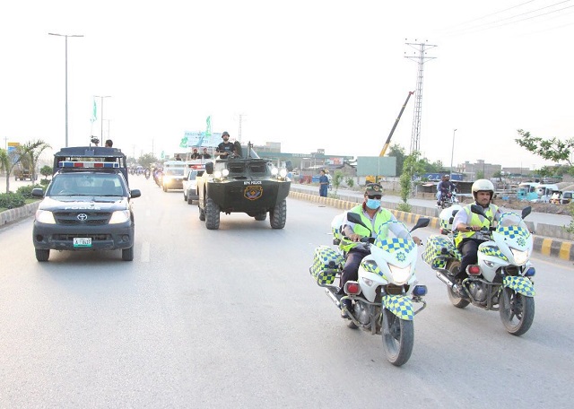 a flag march was organised to show preparedness of the police force photo express