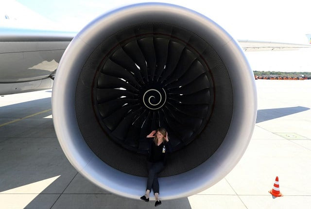 pr agent elsa goette sits in a rolls royce engine of an airbus a350 900 of ethiopian airlines during a site inspection at fraport airport in frankfurt germany may 22 2017 photo reuters pr agent elsa goette sits in a rolls royce engine of an airbus a350 900 of ethiopian airlines during a site inspection at fraport airport in frankfurt germany may 22 2017 photo reuters