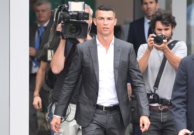 portuguese attacker cristiano ronaldo c arrives on july 16 at the juventus medical center at the alliance stadium in turin cristiano ronaldo arrived in turin ahead of his official unveiling as juventus 039 superstar summer signing on july 17 photo afp