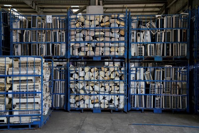 air conditioners about to be recycled are seen in a warehouse at the government sponsored recycling park in the township of guiyu guangdong province china photo reuters file