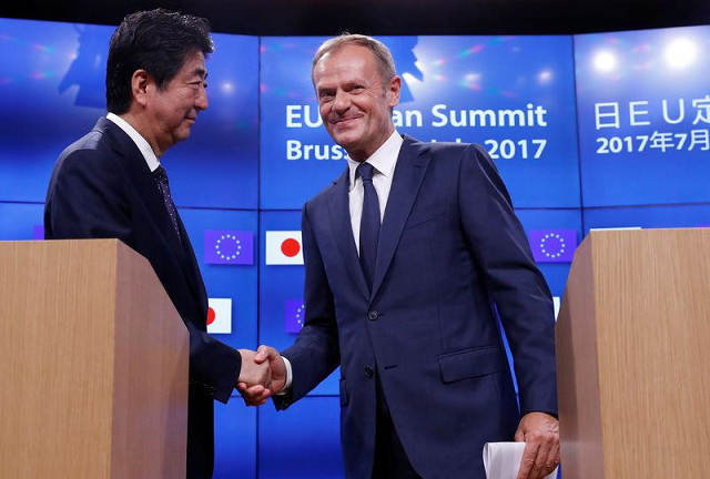 abe said the agreement showed the unshaken political will of japan and the eu to lead the world as the champions of free trade at a time when protectionism had spread photo reuters