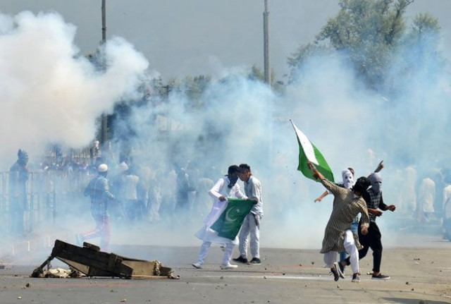 indian forces hurl tear gas at kashmiri protesters in sringar photo afp file indian forces hurl tear gas at kashmiri protesters in sringar photo afp file