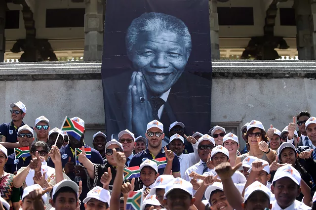 south african cricket team captain faf du plessis poses with school children and teammates at a ceremony to mark the 100th birth anniversary of south african anti apartheid revolutionary and statesman nelson mandela photo afp south african cricket team captain faf du plessis poses with school children and teammates at a ceremony to mark the 100th birth anniversary of south african anti apartheid revolutionary and statesman nelson mandela photo afp