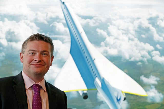 boom supersonic co founder blake scholl poses for a photograph in front of an artists impression of his company 039 s proposed design for an supersonic aircraft dubbed baby boom at the farnborough airshow south west of london on july 18 2018 photo afp boom supersonic co founder blake scholl poses for a photograph in front of an artists impression of his company 039 s proposed design for an supersonic aircraft dubbed baby boom at the farnborough airshow south west of london on july 18 2018 photo afp