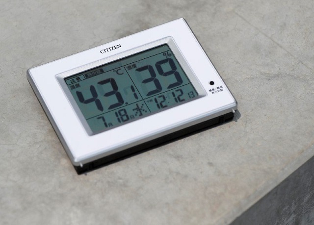 a temperature indicator measures 43 1 degrees celsius placed on the surface of the spectators 039 stand at the construction site of the new national stadium the main stadium of tokyo 2020 olympics and paralympics during a media opportunity in tokyo photo reuters