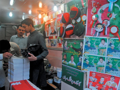a city draped in electioneering but where do the posters flags come from