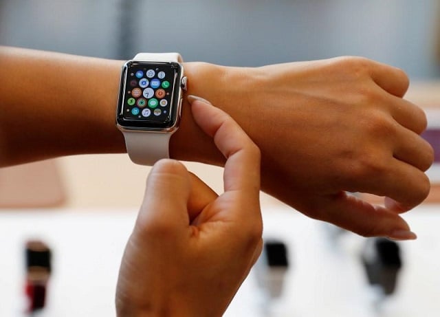 a woman tries a new apple watch series 3 cellular model after it goes on sale at the apple store in tokyo 039 s omotesando shopping district japan september 22 2017 photo reuters