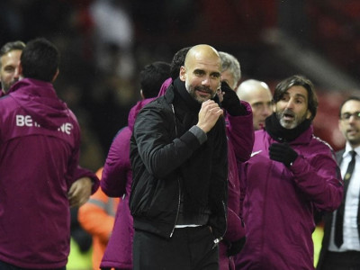 guardiola happy to wait for players to return