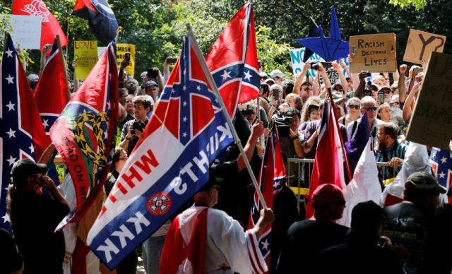 members of the white supremacist ku klux klan face counter protests in charlottesville virginia u s on july 8 2017 photo reuters members of the white supremacist ku klux klan face counter protests in charlottesville virginia u s on july 8 2017 photo reuters