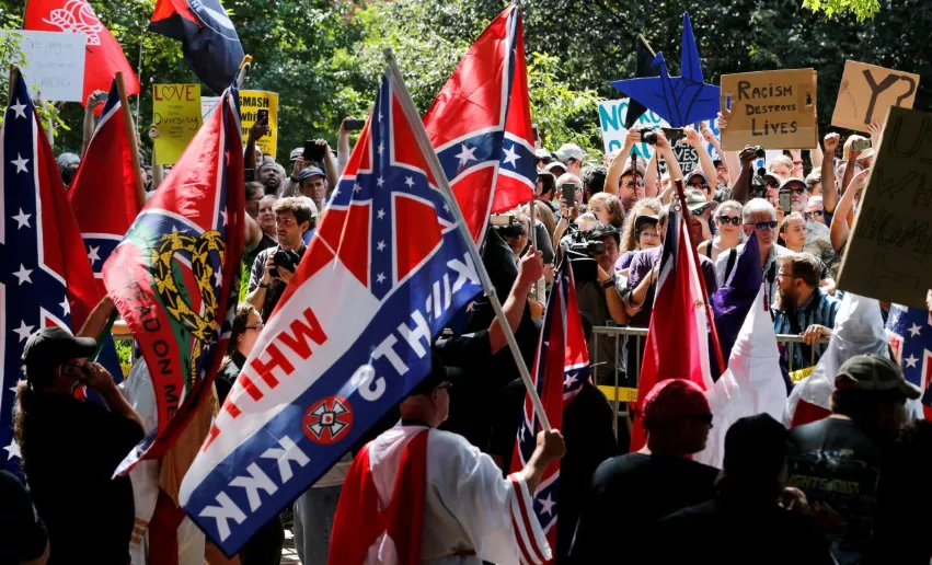 members of the white supremacist ku klux klan face counter protests in charlottesville virginia u s on july 8 2017 photo reuters members of the white supremacist ku klux klan face counter protests in charlottesville virginia u s on july 8 2017 photo reuters