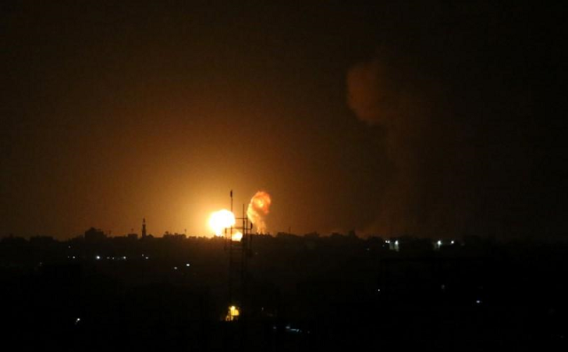 an explosion is seen following an israeli air strike in the southern gaza strip july 20 2018 photo reuters