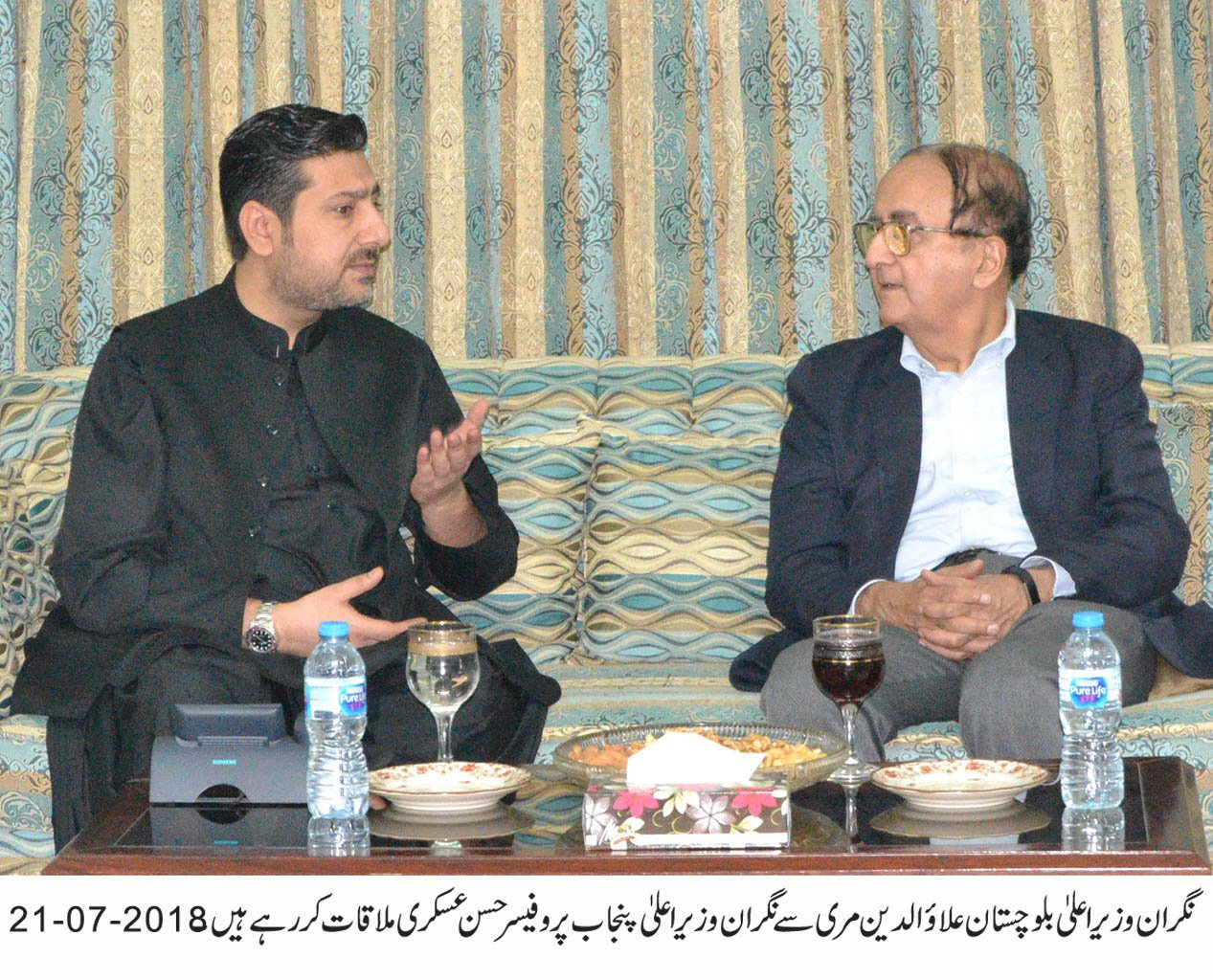 caretaker balochistan chief minister alauddin marri gestures during a meeting with interim punjab chief minister hasan askari at the cm house quetta photo express