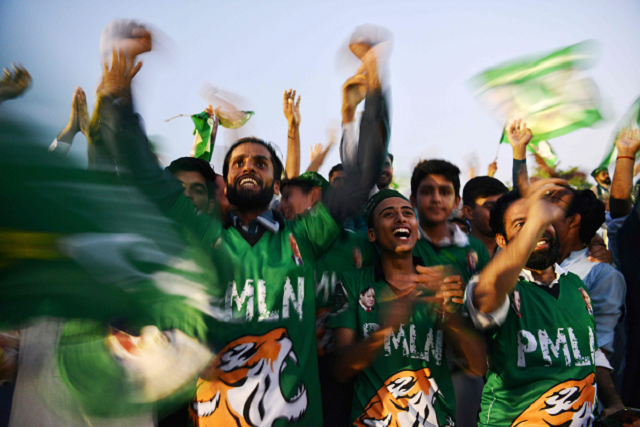 supporters dance and cheer to songs during an election campaign rally photo afp