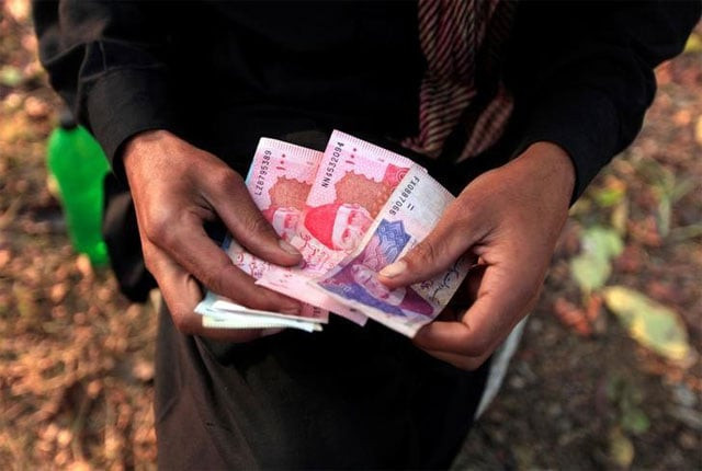 say debt of govt s holding company has already swelled to rs550b photo reuters say debt of govt s holding company has already swelled to rs550b photo reuters