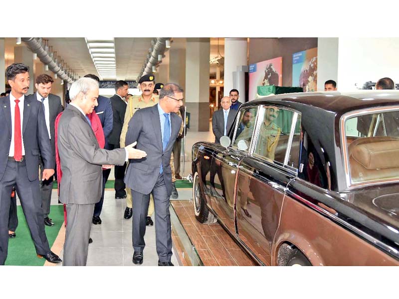 interim pm nasirul mulk and caretaker information minister barrister syed ali zafar look at the 1976 rolls royce silver shadow on display at the pakistan monument museum photo inp