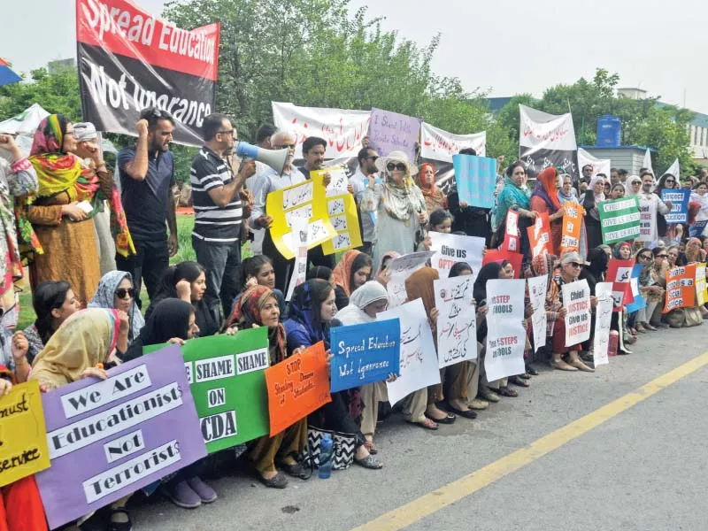 members of all pakistan private schools and colleges association hold protest against cda sealing schools in islamabad photo zafar aslam express members of all pakistan private schools and colleges association hold protest against cda sealing schools in islamabad photo zafar aslam express