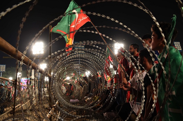 barbed wire at a pti jalsa photo afp