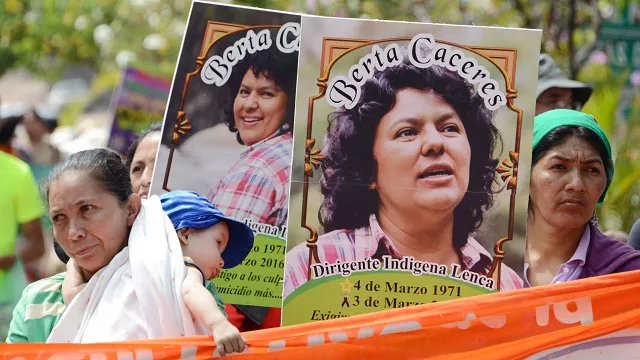 banners at a protest for slain environmentalist photo afp banners at a protest for slain environmentalist photo afp
