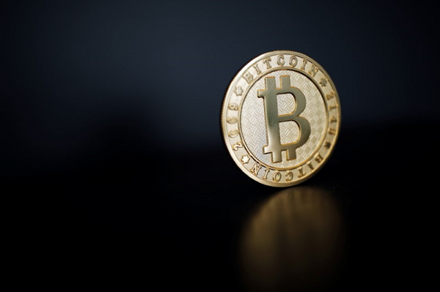 a bitcoin virtual currency coin is seen in an illustration picture taken at la maison du bitcoin in paris france june 23 2017 photo reuters a bitcoin virtual currency coin is seen in an illustration picture taken at la maison du bitcoin in paris france june 23 2017 photo reuters