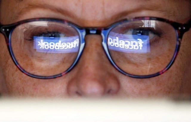 the facebook logo is reflected on a woman 039 s glasses in this photo illustration taken june 3 2018 photo reuters