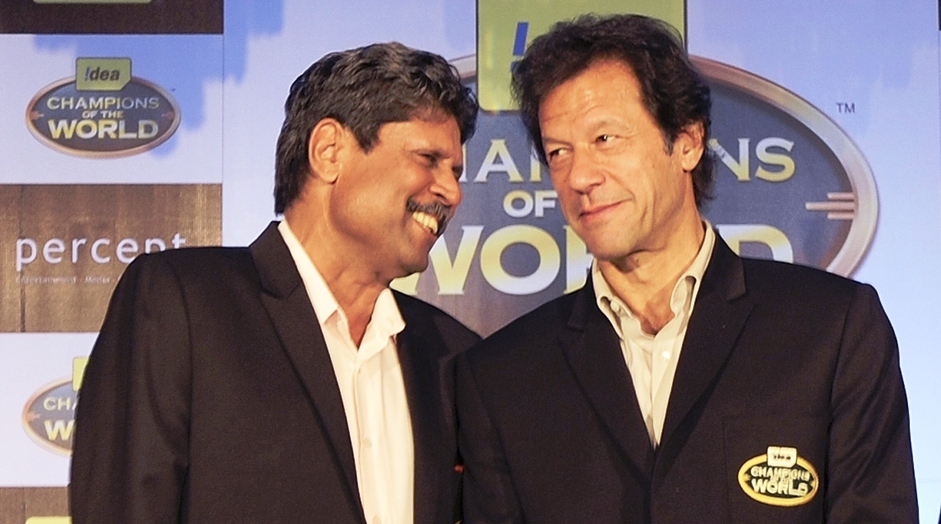 previous cricket world cup winning captains kapil dev of india l and imran khan r of pakistan speak during a promotional function of a telecom company in mumbai photo afp