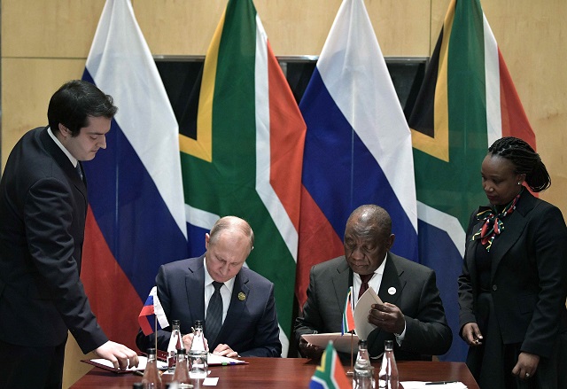 russia 039 s president vladimir putin 2nd l and south africa 039 s president cyril ramaphosa 2nd r attend a signing ceremony on the sidelines of the brics summit in johannesburg south africa july 26 2018 photo reuters