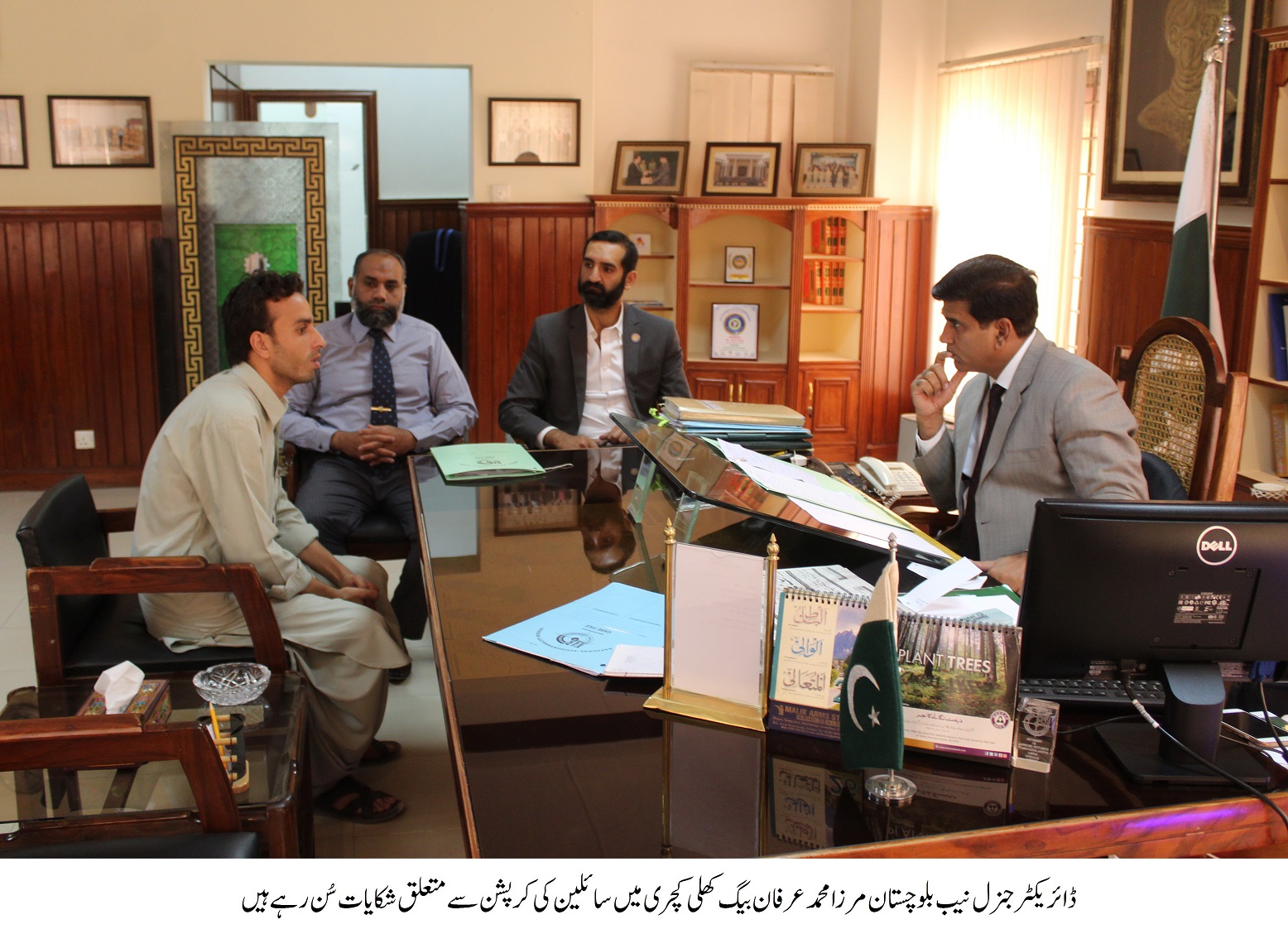 nab director general mirza muhammad irfan baig listening to the complaint of an individual during the open court photo express