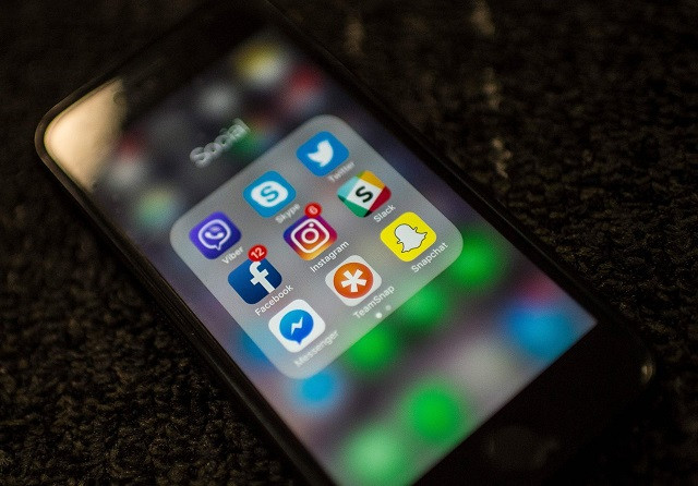 the picture shows social network applications including facebook instagram slack snapchat photo afp the picture shows social network applications including facebook instagram slack snapchat photo afp