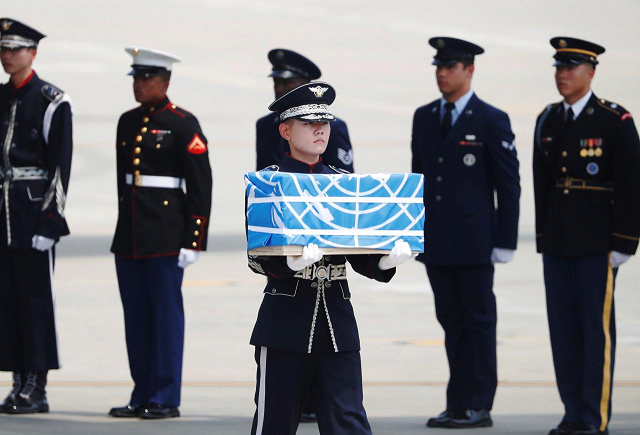 a soldier carries a casket containing the remains of a u s soldier who was killed in the korean war during a ceremony at osan air base in pyeongtaek south korea july 27 2018 photo reuters a soldier carries a casket containing the remains of a u s soldier who was killed in the korean war during a ceremony at osan air base in pyeongtaek south korea july 27 2018 photo reuters