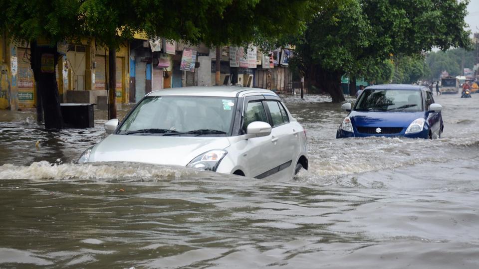 flooded roads following heavy rain in mathura uttar pradesh on july 26 2018 photo afp