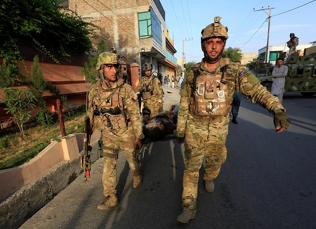 isual coverage of scenes of injury or death afghan security forces carry the body of a victim after an attack at a midwife training center in jalalabad city afghanistan july 28 2018 photo reuters