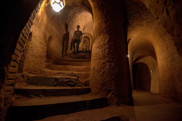 a man walks down step in master levon 039 s divine underground in armenia photo afp a man walks down step in master levon 039 s divine underground in armenia photo afp