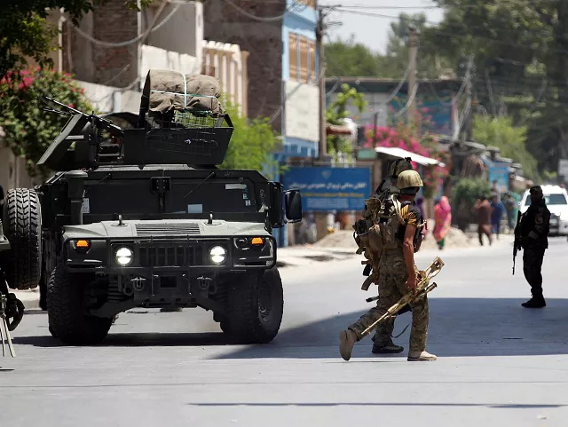 as security forces closed off the area gunshots could be heard and a clouds of black smoke spiraled into the sky above the area photo reuters as security forces closed off the area gunshots could be heard and a clouds of black smoke spiraled into the sky above the area photo reuters