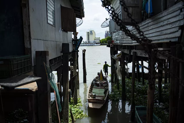 a diver of the thai community quot indian jones quot stands on his boat photo afp a diver of the thai community quot indian jones quot stands on his boat photo afp