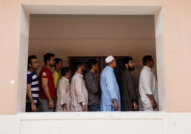 voters in line on election day photo afp