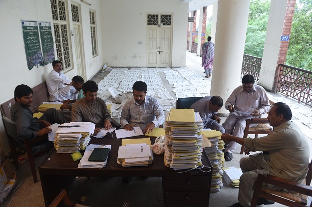 ecp order re polling in two constituencies photo afp