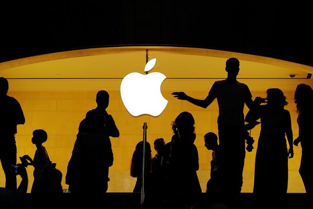 customers walk past an apple logo inside of an apple store at grand central station in new york us august 1 2018 photo reuters