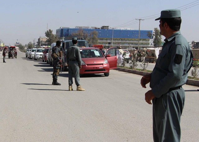 an afghan security official said they found identity cards next to the bodies and were seeking confirmation from the company photo reuters an afghan security official said they found identity cards next to the bodies and were seeking confirmation from the company photo reuters