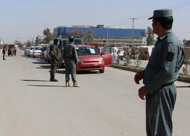 an afghan security official said they found identity cards next to the bodies and were seeking confirmation from the company photo reuters