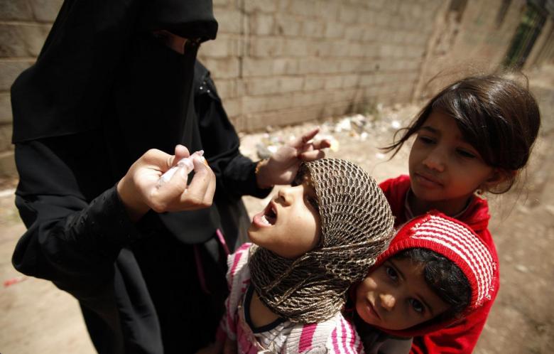 representational image of a health worker administering drops of polio vaccine to children photo reuters